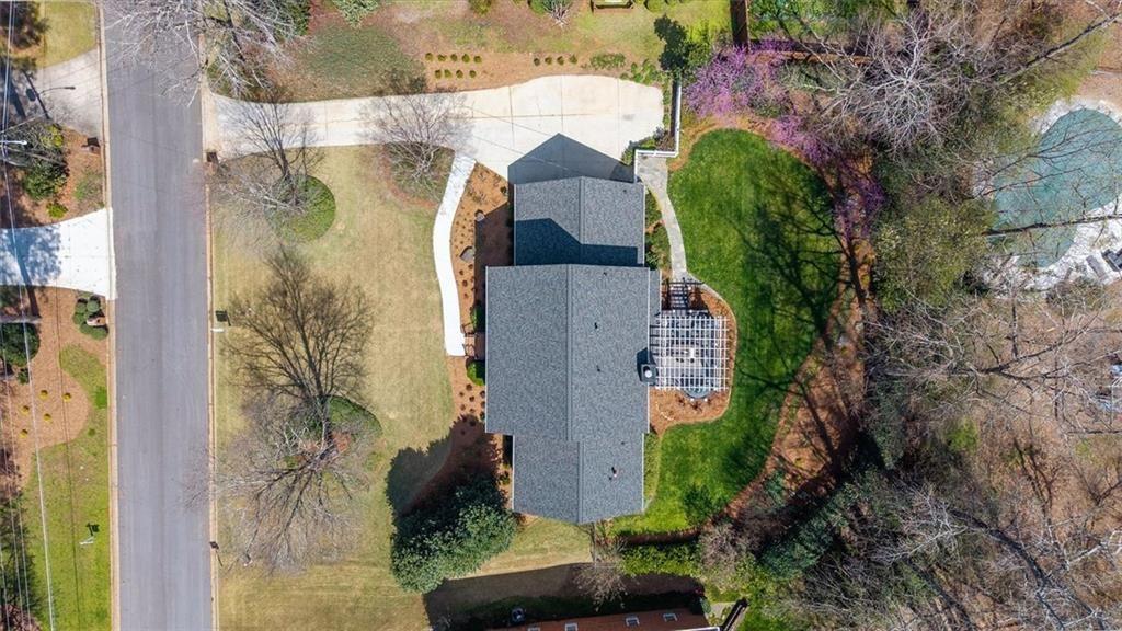 4890 Forestglade Court Smoke Rise, GA 30087 - Photo 2 of 50 an aerial view of residential houses with outdoor space