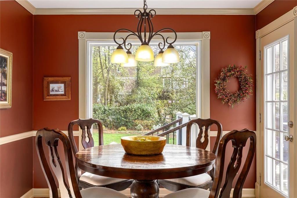 4890 Forestglade Court Smoke Rise, GA 30087 - Photo 24 of 50 a view of a dining room with furniture window and outside view