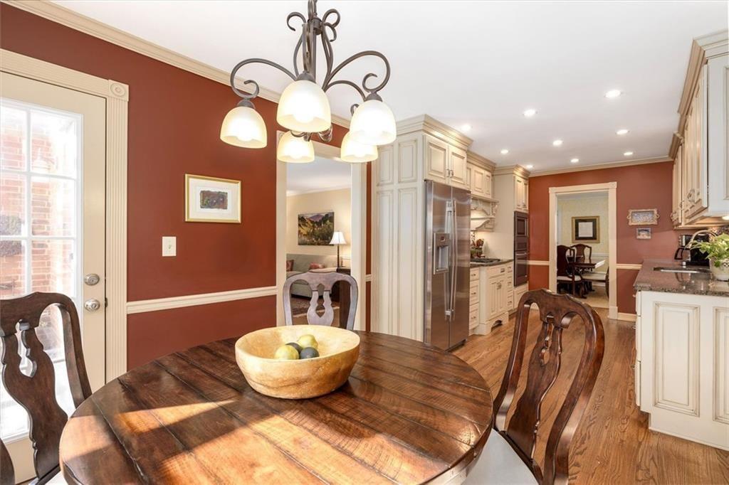 4890 Forestglade Court Smoke Rise, GA 30087 - Photo 25 of 50 a view of a dining room with furniture