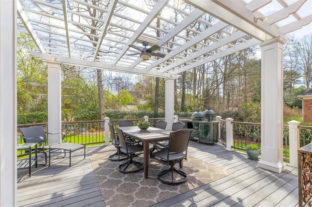 4890 Forestglade Court Smoke Rise, GA 30087 - Photo 27 of 50 a view of a dining room with furniture window and outside view