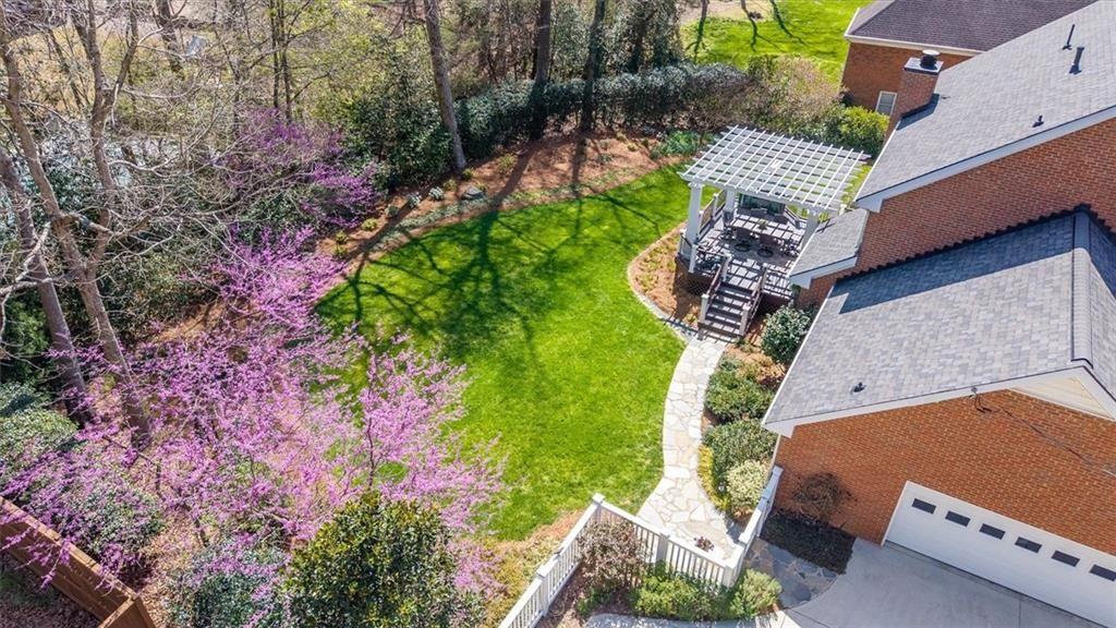 4890 Forestglade Court Smoke Rise, GA 30087 - Photo 44 of 50 an aerial view of a house with a yard