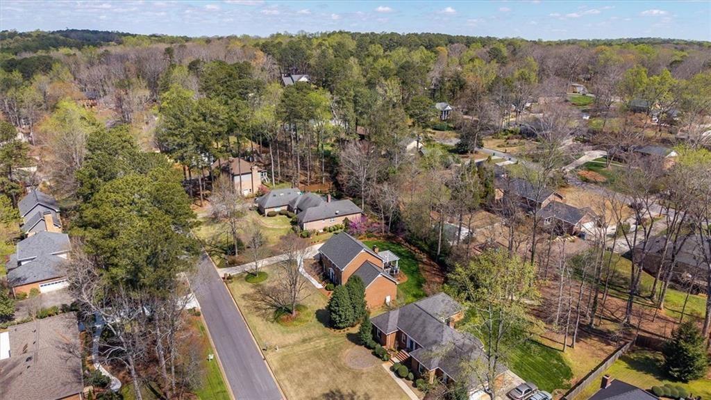 4890 Forestglade Court Smoke Rise, GA 30087 - Photo 46 of 50 an aerial view of residential houses with outdoor space