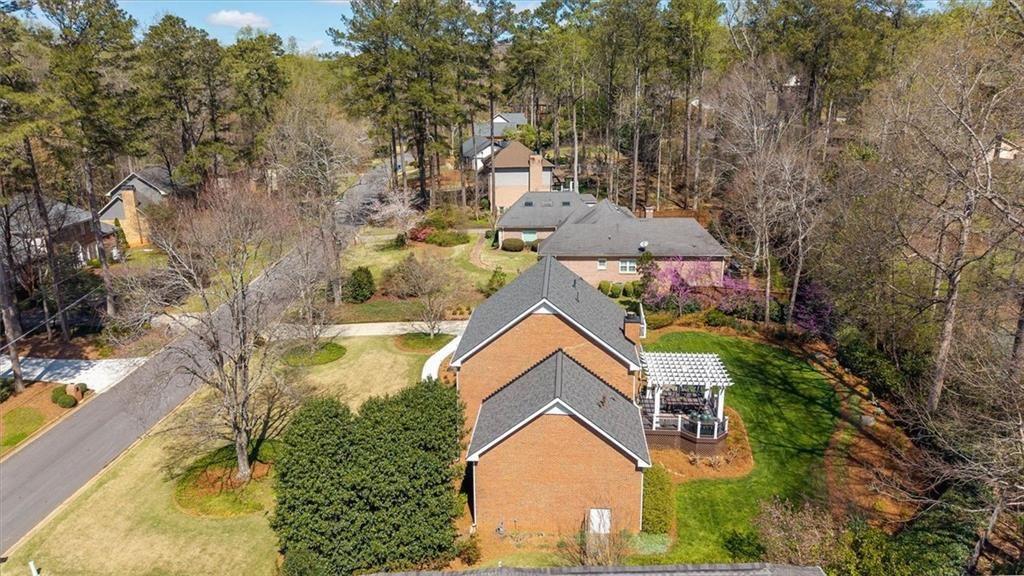 4890 Forestglade Court Smoke Rise, GA 30087 - Photo 48 of 50 an aerial view of residential houses with outdoor space