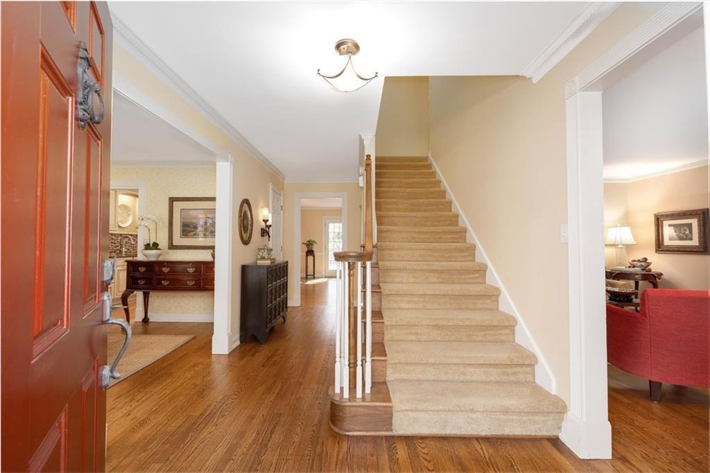 4890 Forestglade Court Smoke Rise, GA 30087 - Photo 8 of 50 a view of entryway and hall with wooden floor