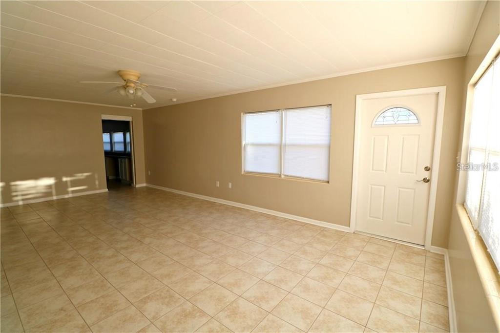 1222 St Anne Shrine Road Lake Wales, FL 33898 - Photo 5 of 14 an empty room with a natural light