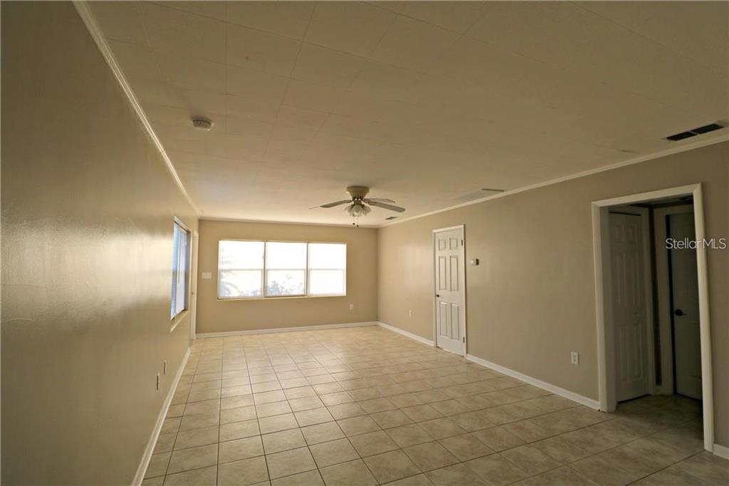 1222 St Anne Shrine Road Lake Wales, FL 33898 - Photo 7 of 14 a view of an empty room and window