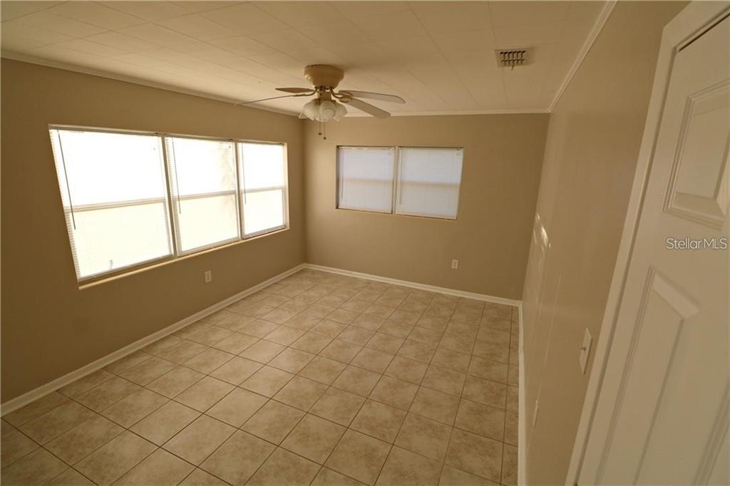 1222 St Anne Shrine Road Lake Wales, FL 33898 - Photo 10 of 14 a view of an empty room and window