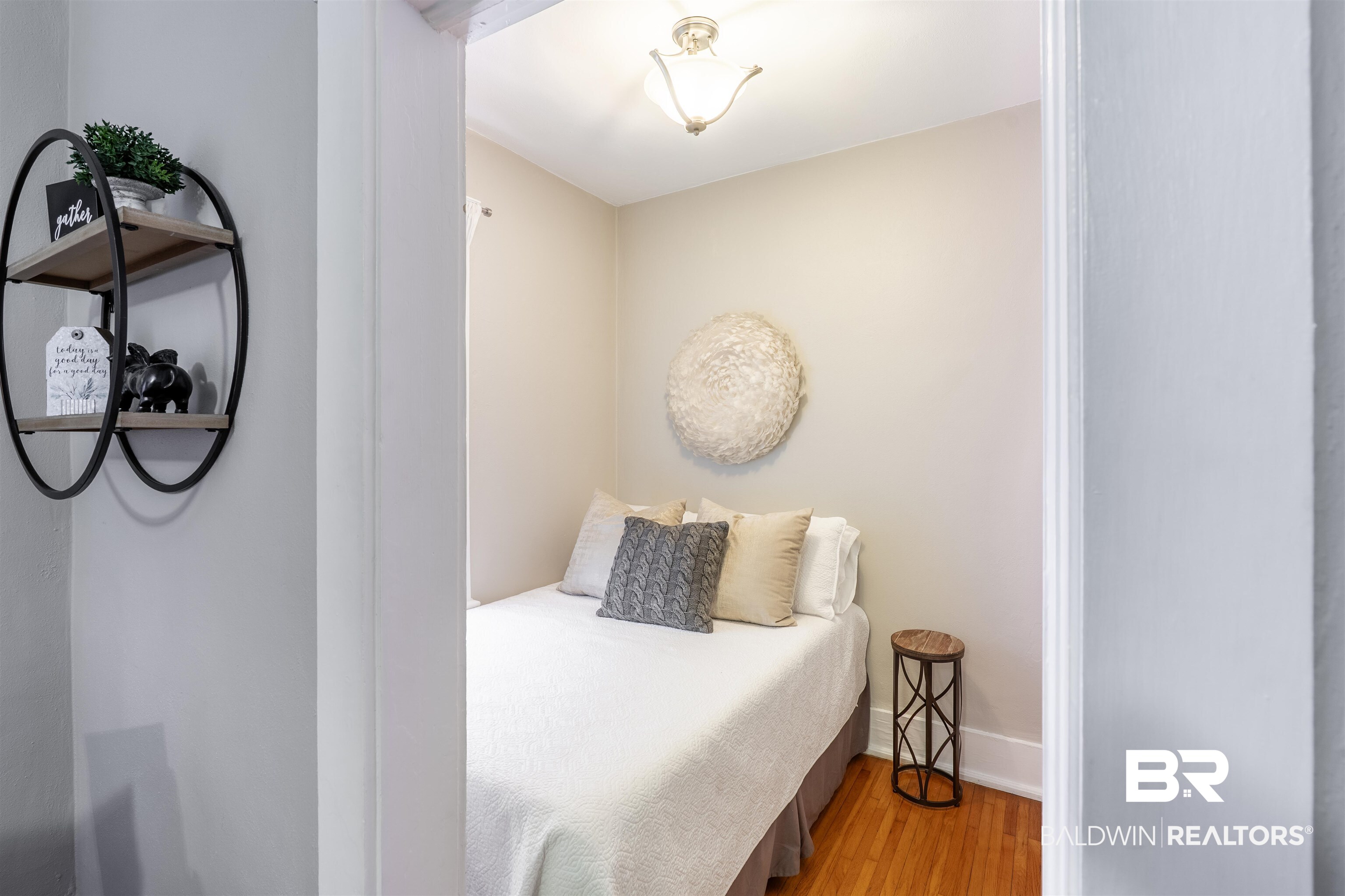 1600 Government Street, Unit 3F Mobile, AL 36604 - Photo 6 of 18 Bedroom featuring wood finished floors and baseboards