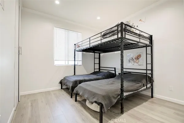 a spacious bathroom with a granite countertop sink and a mirror