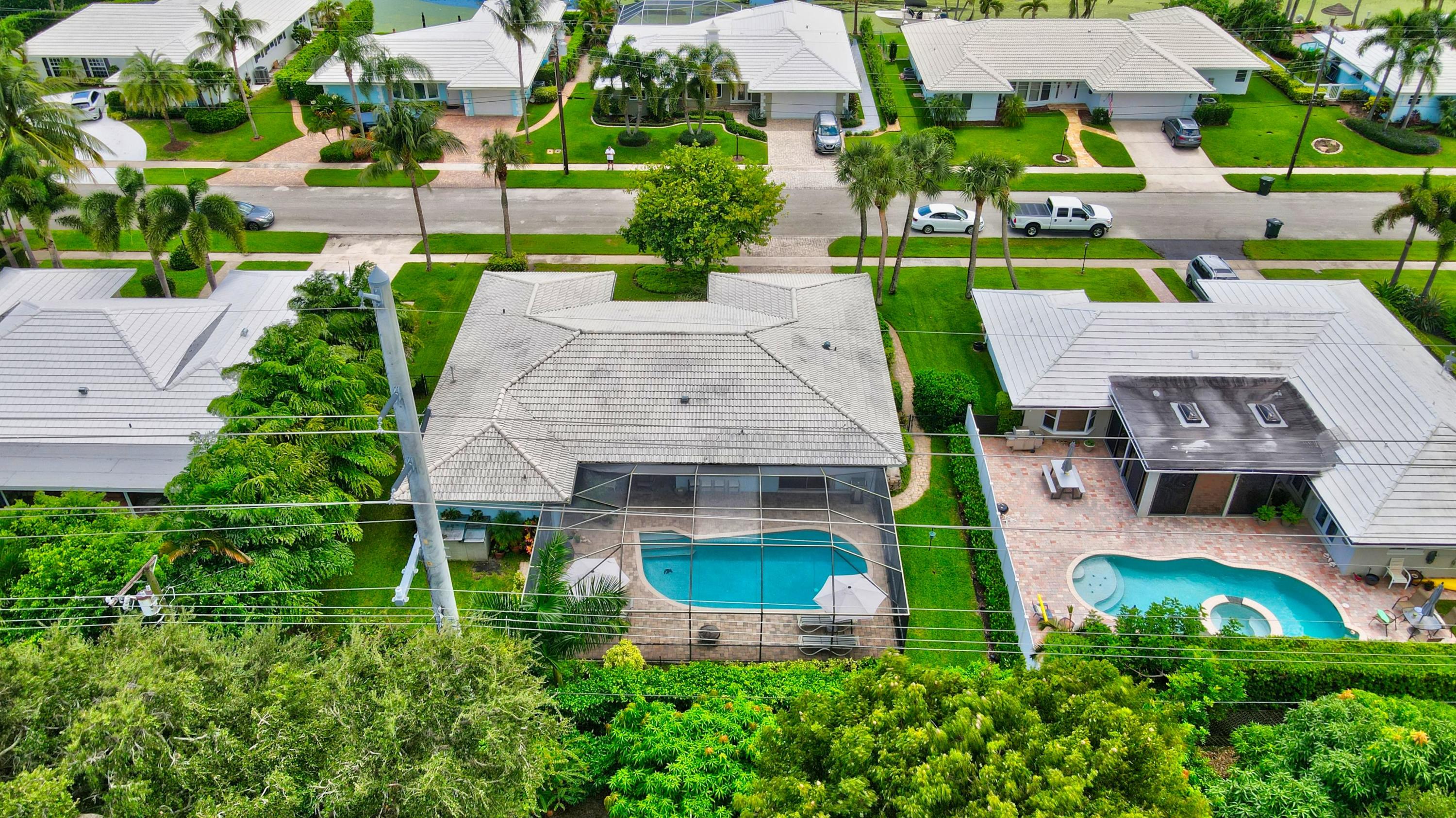 727 Apple Tree Lane Boca Raton, FL 33486 - Photo 40 of 42 drone back of house