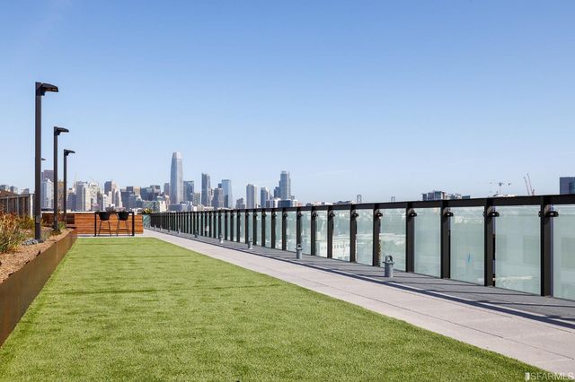a view of a roof deck with couches