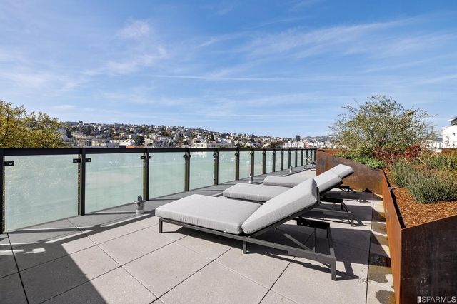 a sitting area with furniture and city view