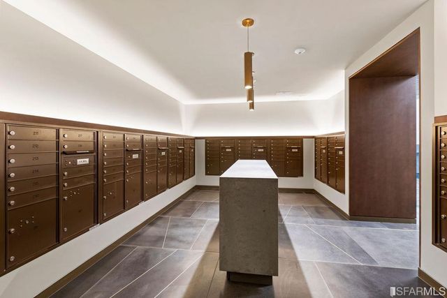 a view of a room with entryway and furniture