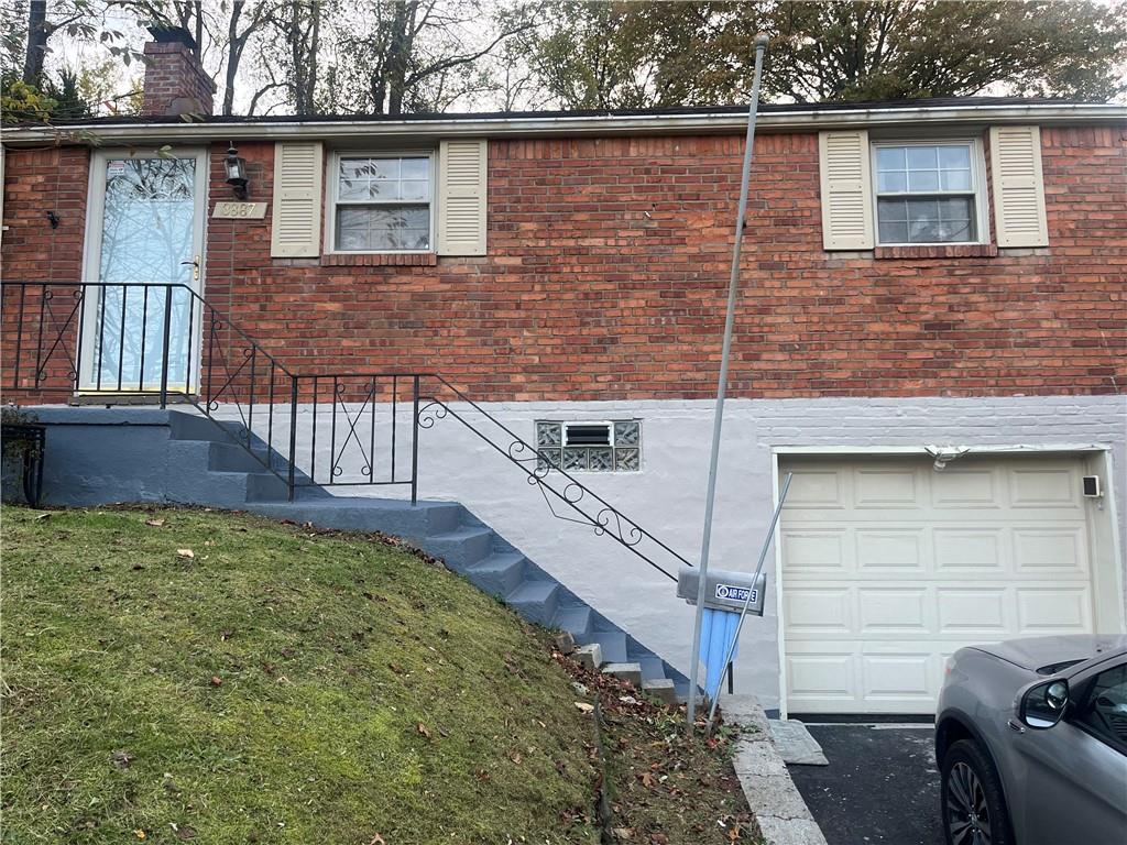 3887 Delco Road Brentwood, PA 15227 - Photo 2 of 14 a view of backyard with barbeque grill and wooden fence