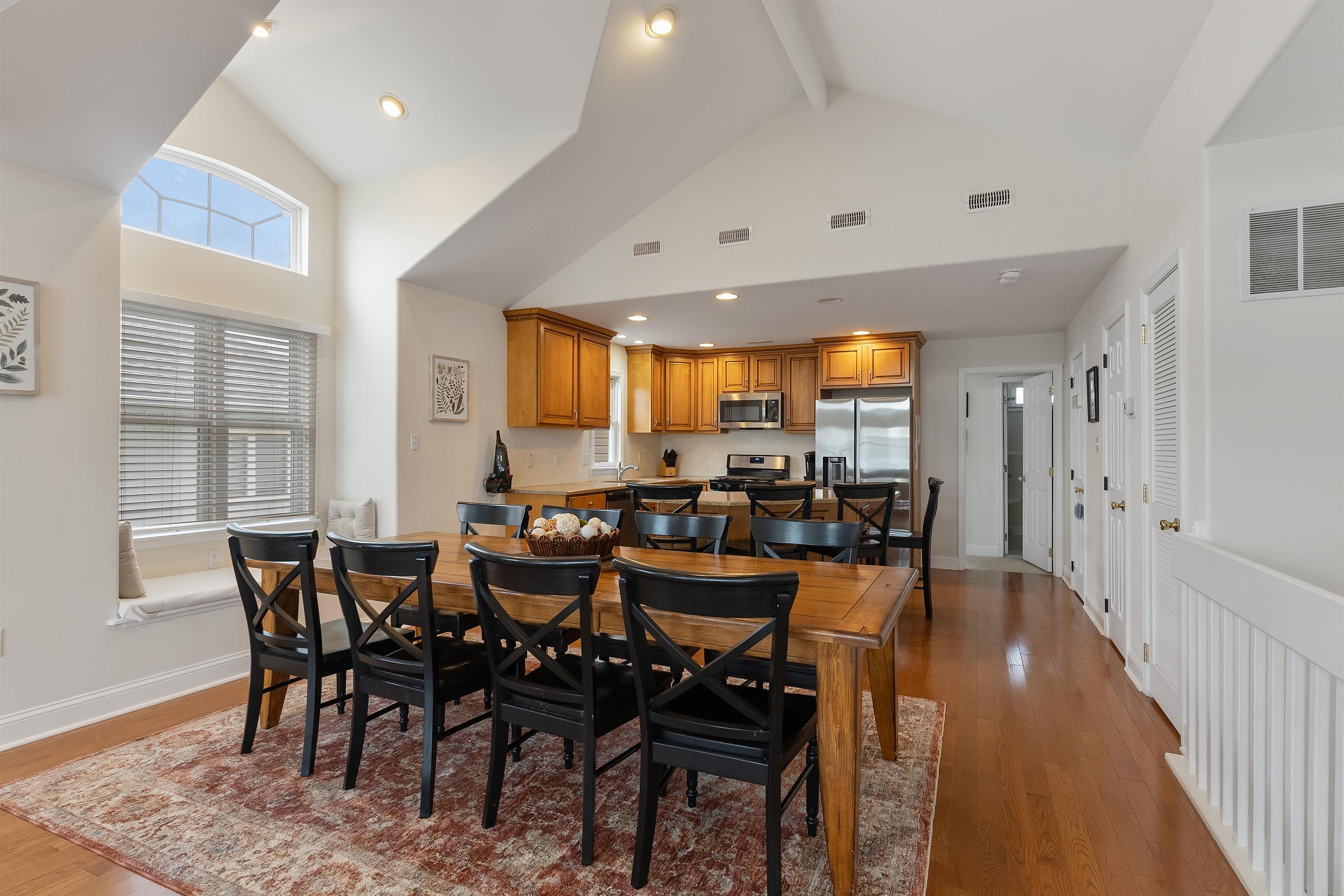 33 74th Street, Unit WEST Sea Isle City, NJ 08243 - Photo 13 of 48 a view of a dining area with furniture