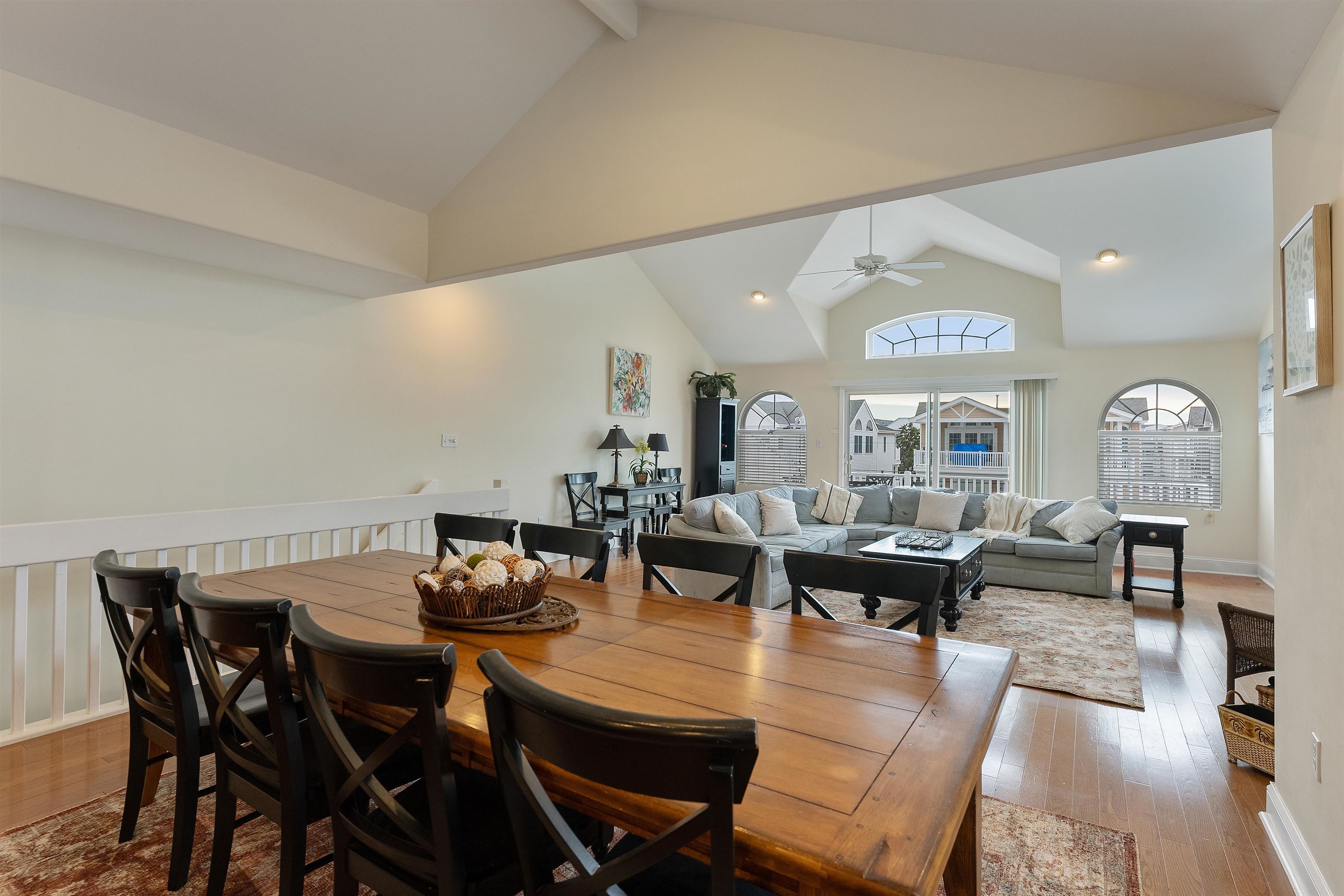 33 74th Street, Unit WEST Sea Isle City, NJ 08243 - Photo 18 of 48 a view of a dining room with furniture and wooden floor