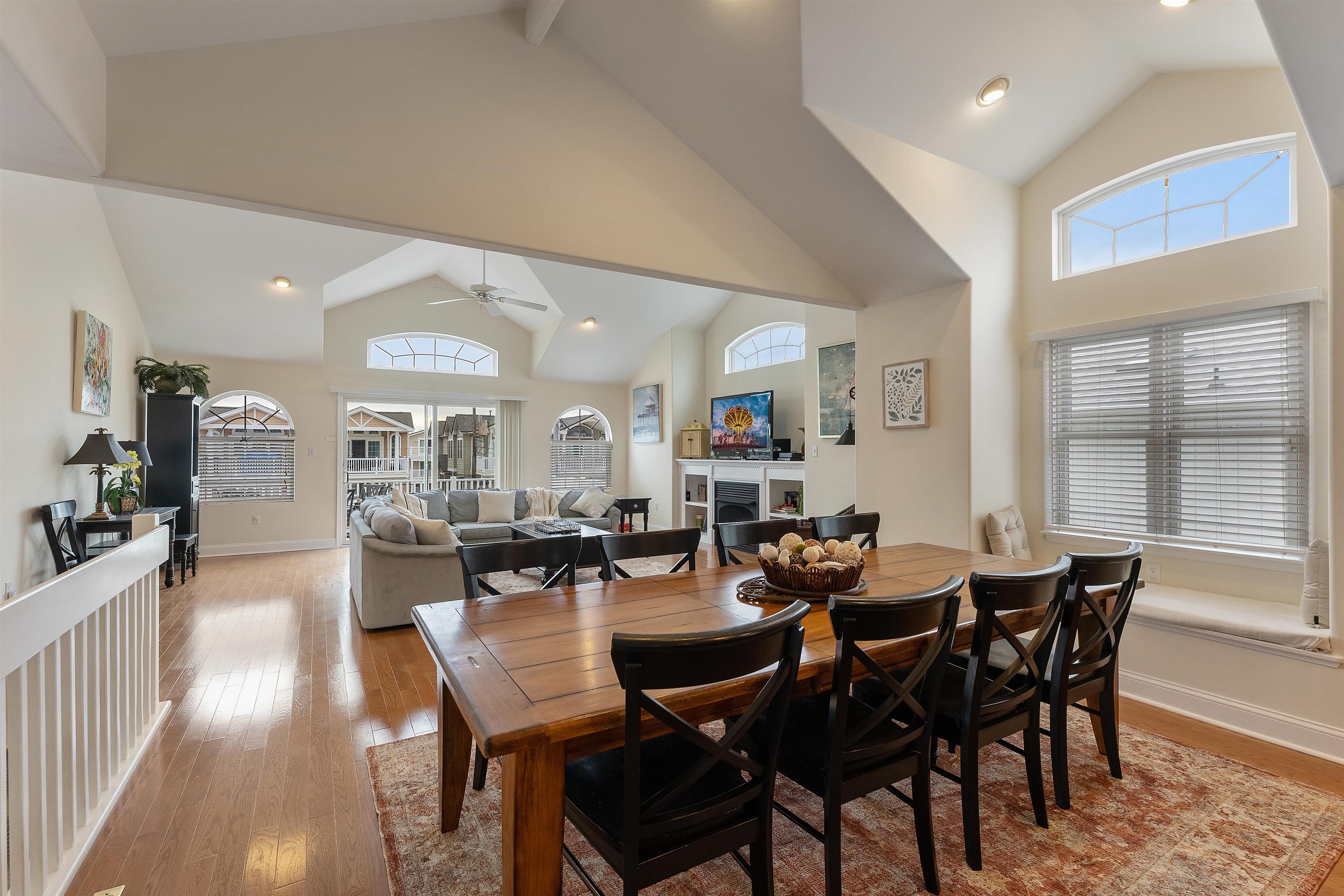 33 74th Street, Unit WEST Sea Isle City, NJ 08243 - Photo 19 of 48 a view of a dining room with furniture and wooden floor