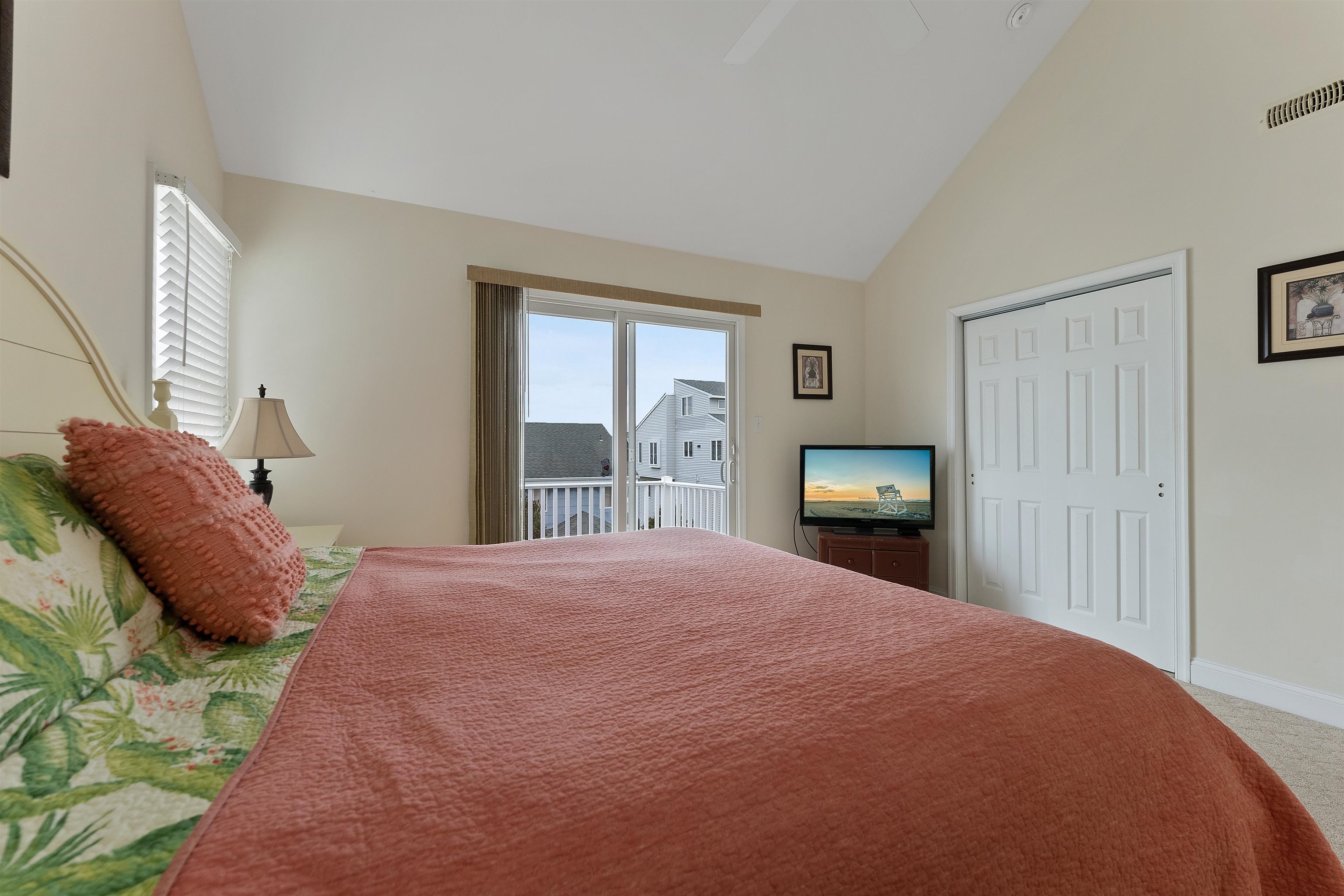33 74th Street, Unit WEST Sea Isle City, NJ 08243 - Photo 24 of 48 a bedroom with a bed and window