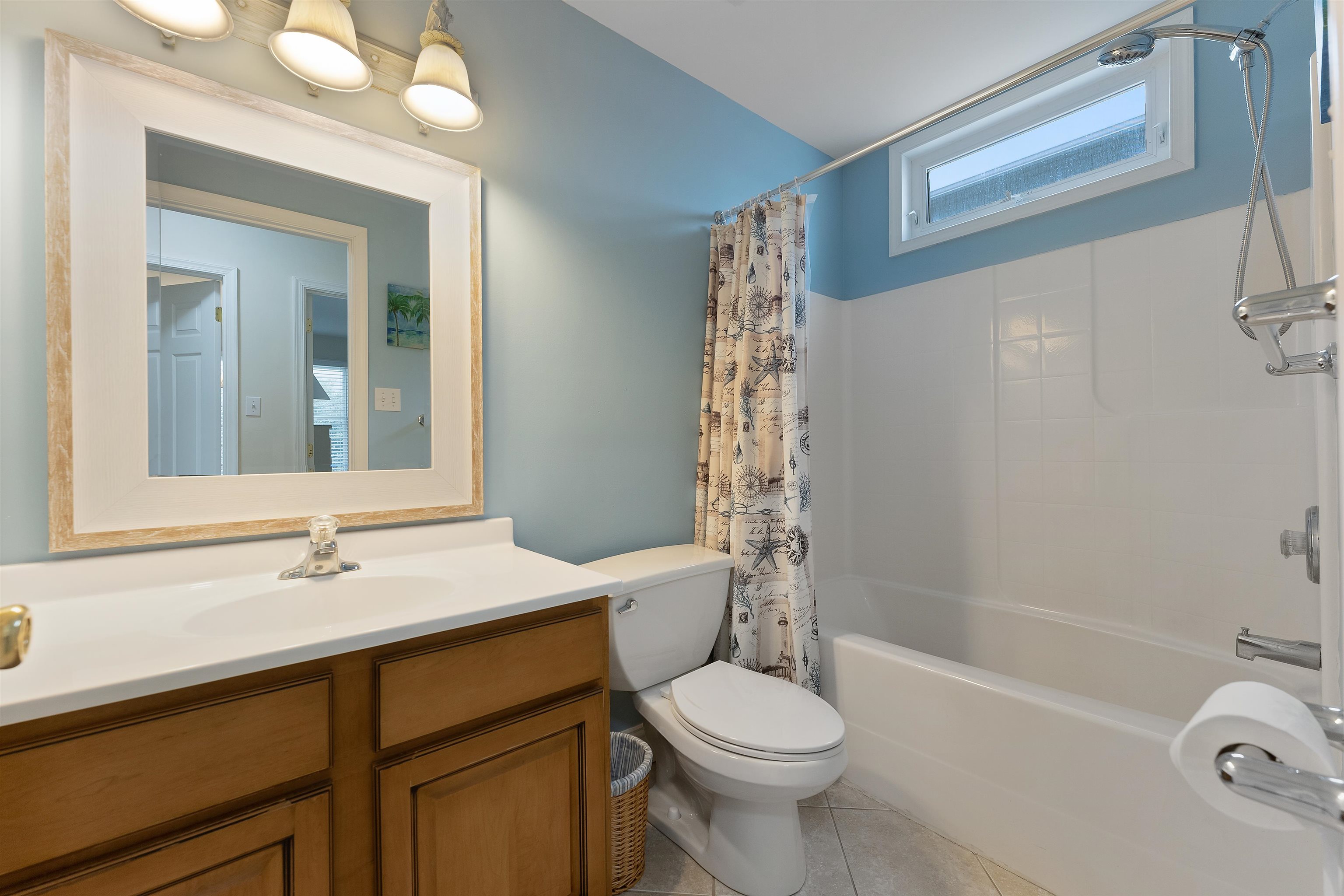 33 74th Street, Unit WEST Sea Isle City, NJ 08243 - Photo 38 of 48 a bathroom with a sink a toilet and a bathtub