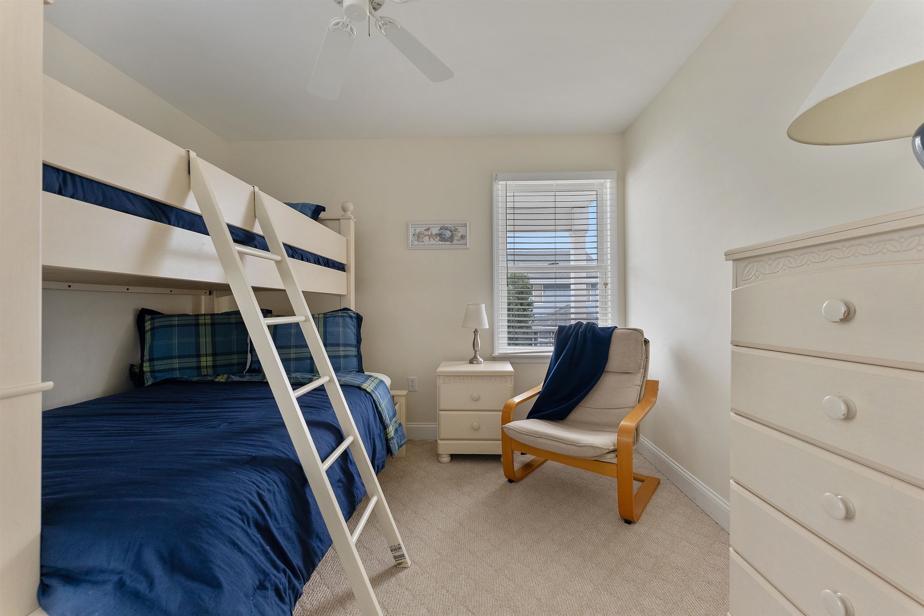 33 74th Street, Unit WEST Sea Isle City, NJ 08243 - Photo 40 of 48 a living room with furniture and a wooden floor