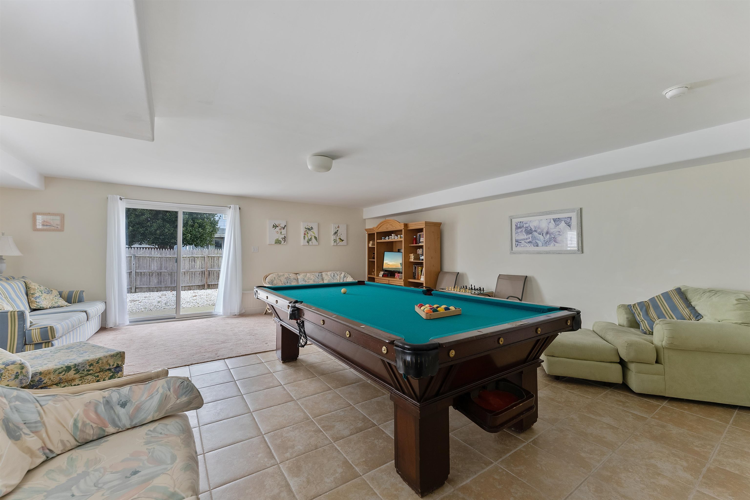 33 74th Street, Unit WEST Sea Isle City, NJ 08243 - Photo 43 of 48 a room with furniture and window