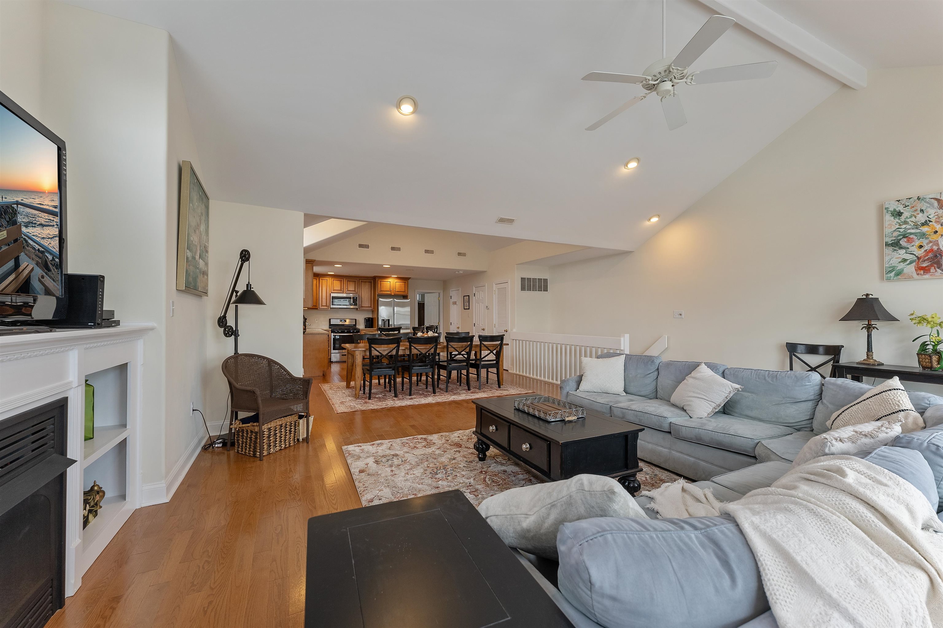 33 74th Street, Unit WEST Sea Isle City, NJ 08243 - Photo 5 of 48 a living room with furniture and a flat screen tv