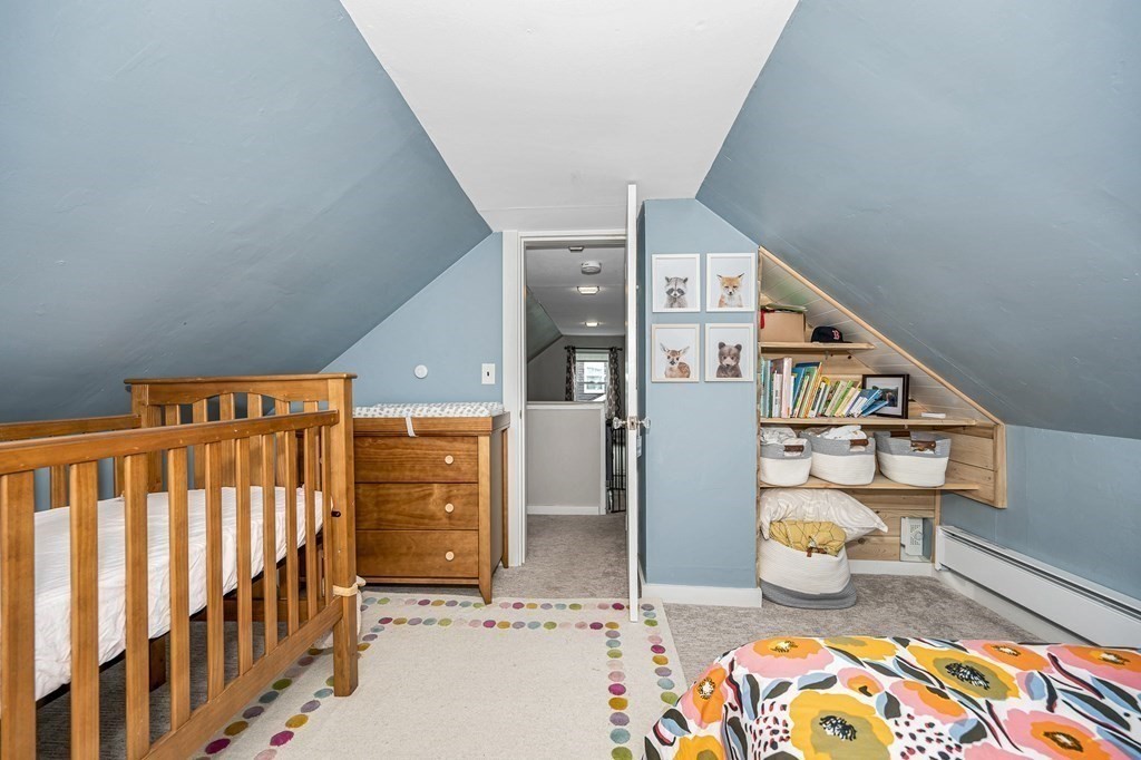 19 Curtis Road Saugus, MA 01906 - Photo 18 of 36 a bedroom with furniture and a window