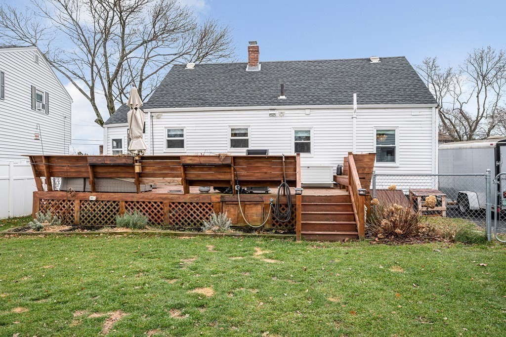 19 Curtis Road Saugus, MA 01906 - Photo 36 of 36 a front view of a house with garden