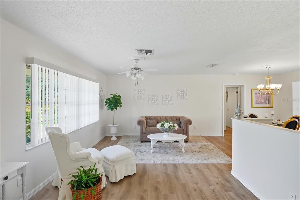 305 Edison Street Inverness, FL 34452 - Photo 9 of 44 a living room with furniture and wooden floor