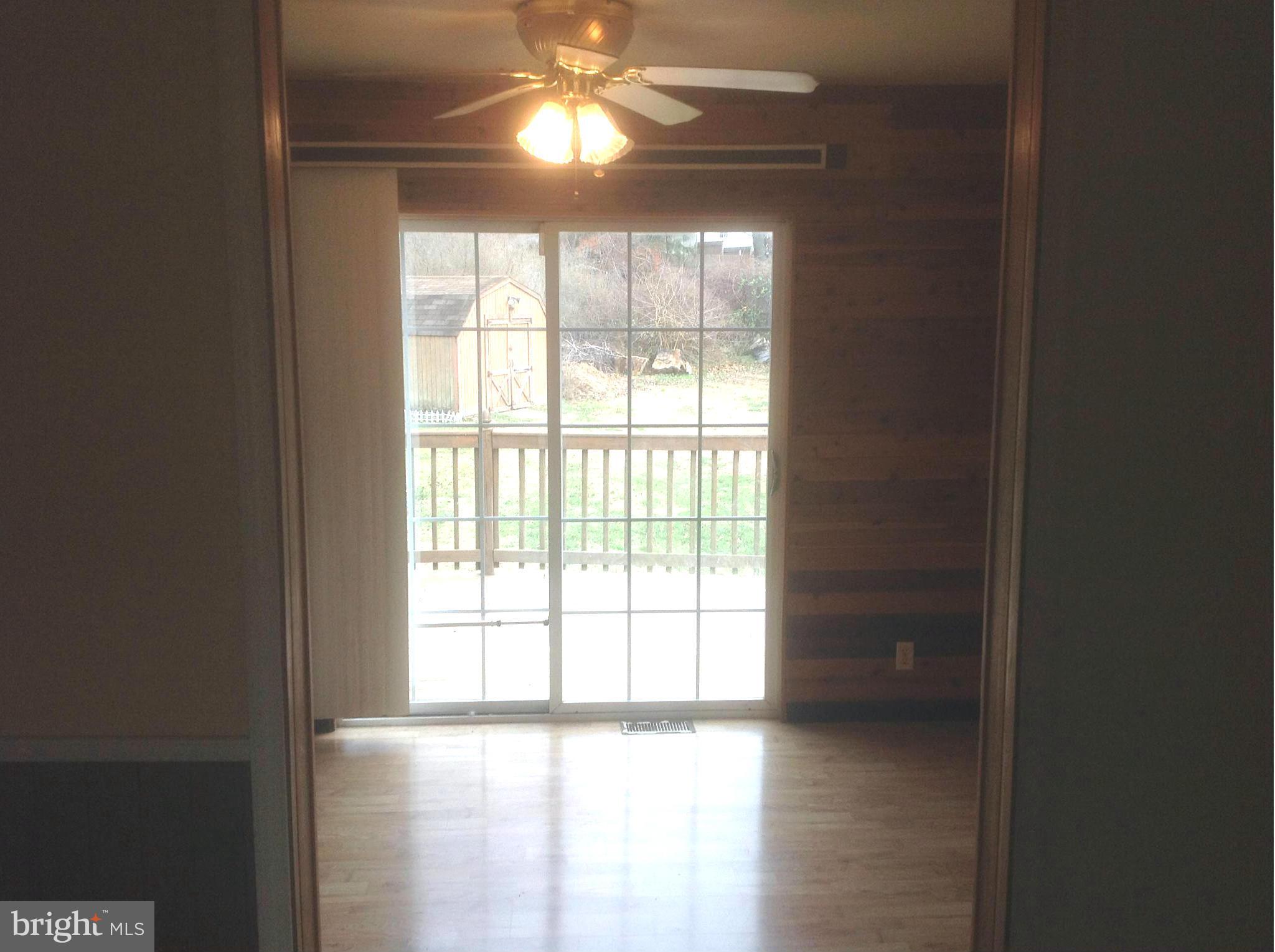 1640 Gibbons Road Point of Rocks, MD 21777 - Photo 5 of 20 a view of an empty room with a window