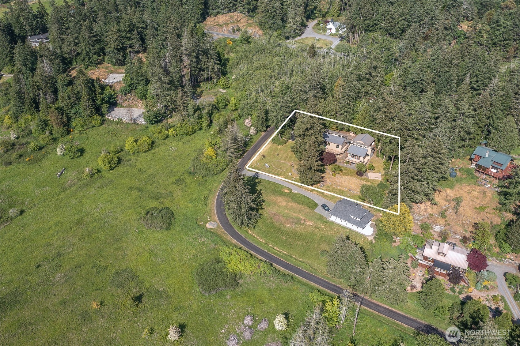 402 Cayou Valley Road Orcas Island, WA 98245 - Photo 17 of 40 a view of a swimming pool with a lake view