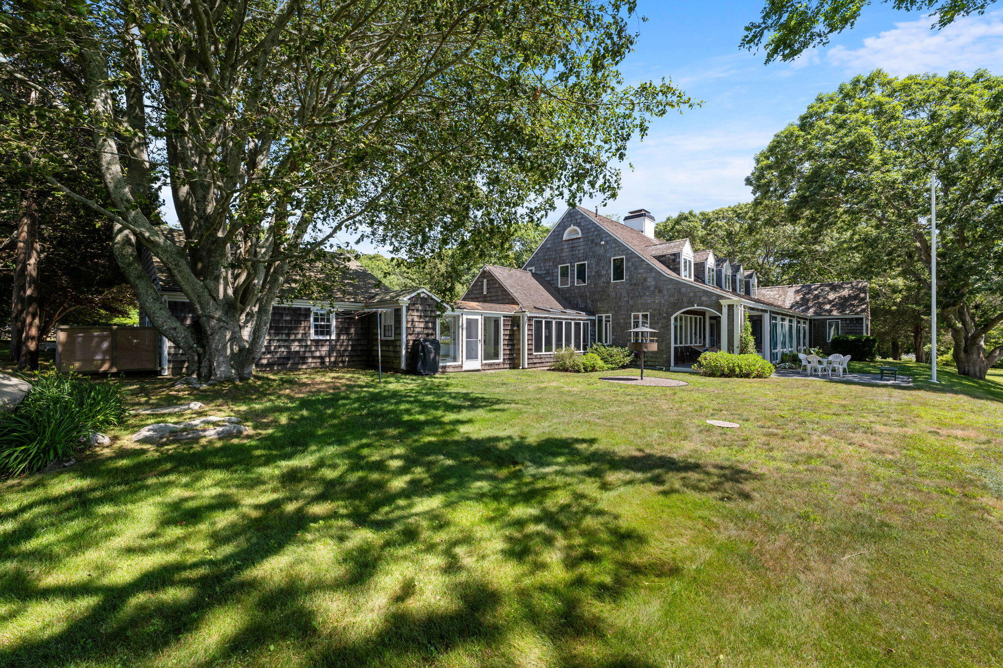 32 Chapoquoit Road Falmouth, MA 02540 - Photo 8 of 50 waterside -Garage side of house