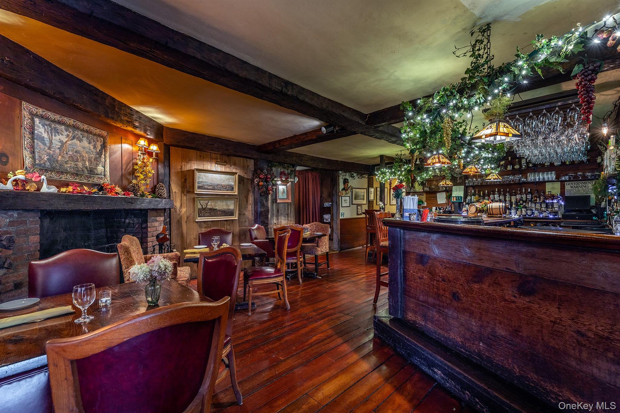 4258 Highway 44 Millbrook, NY 12545 - Photo 14 of 36 a living room with furniture and a fireplace