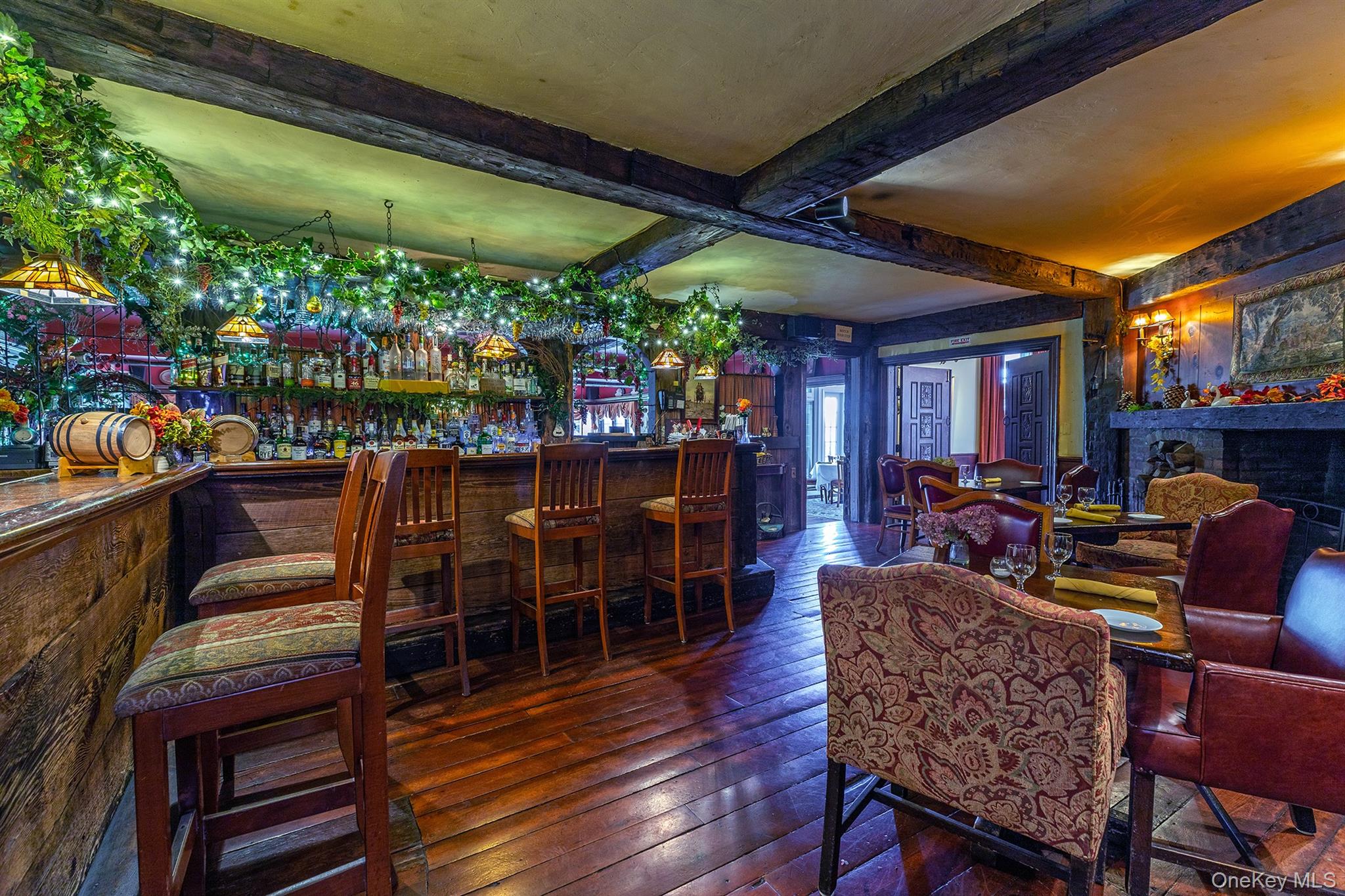 4258 Highway 44 Millbrook, NY 12545 - Photo 15 of 36 a view of a chairs and tables in patio with a barbeque grill