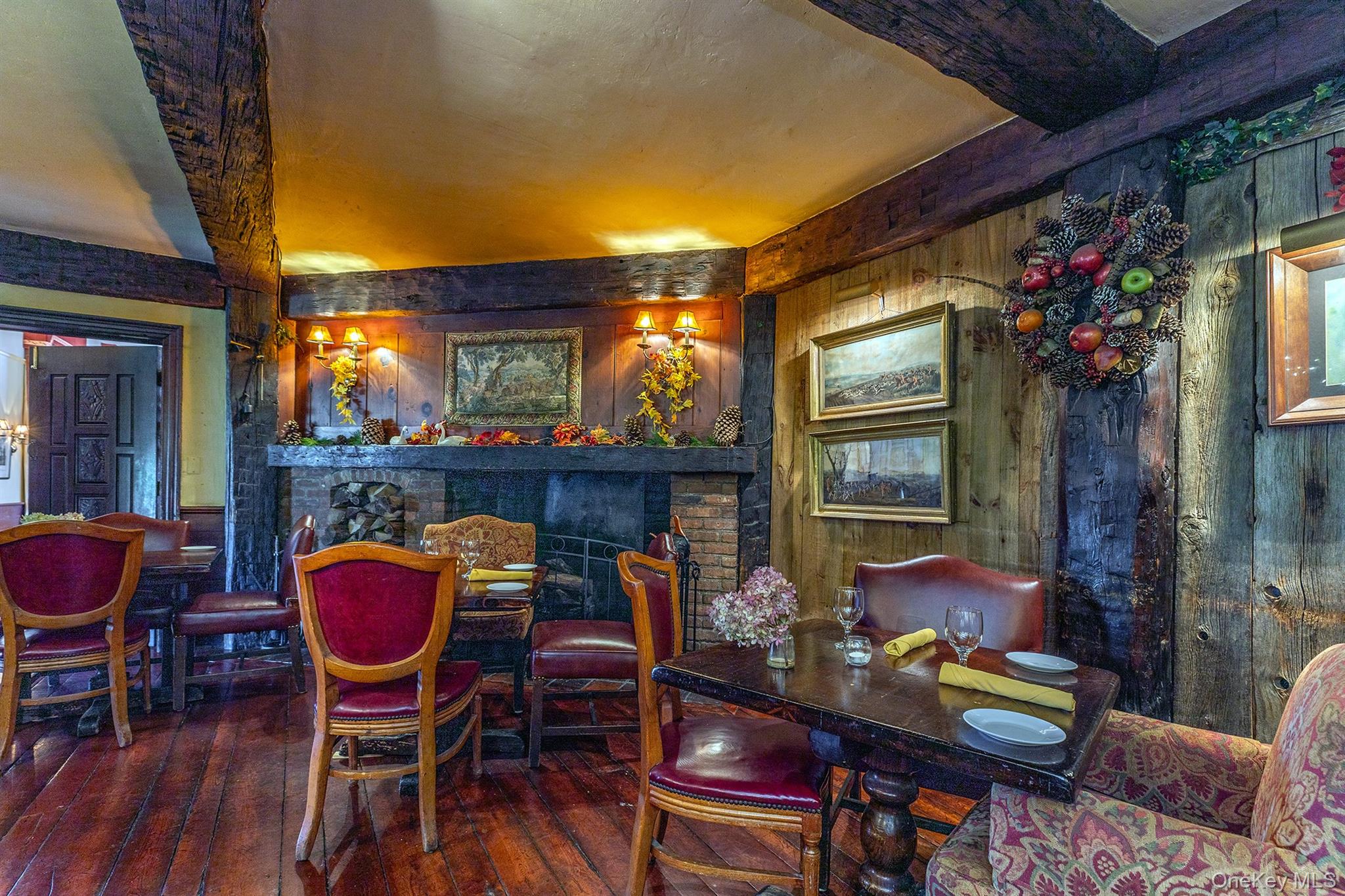 4258 Highway 44 Millbrook, NY 12545 - Photo 16 of 36 a dining room with furniture and wooden floor