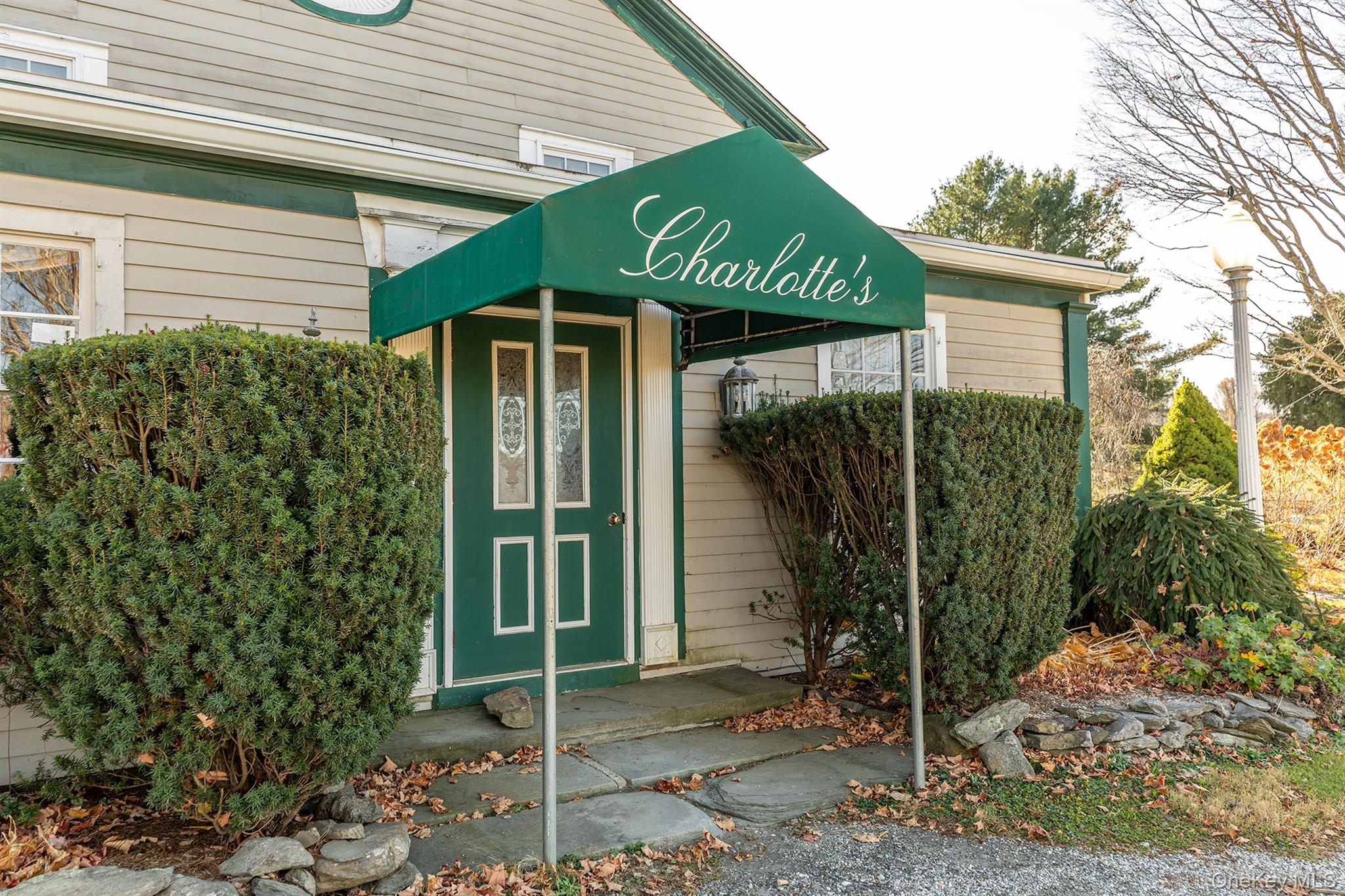 4258 Highway 44 Millbrook, NY 12545 - Photo 8 of 36 a front view of a house with garden