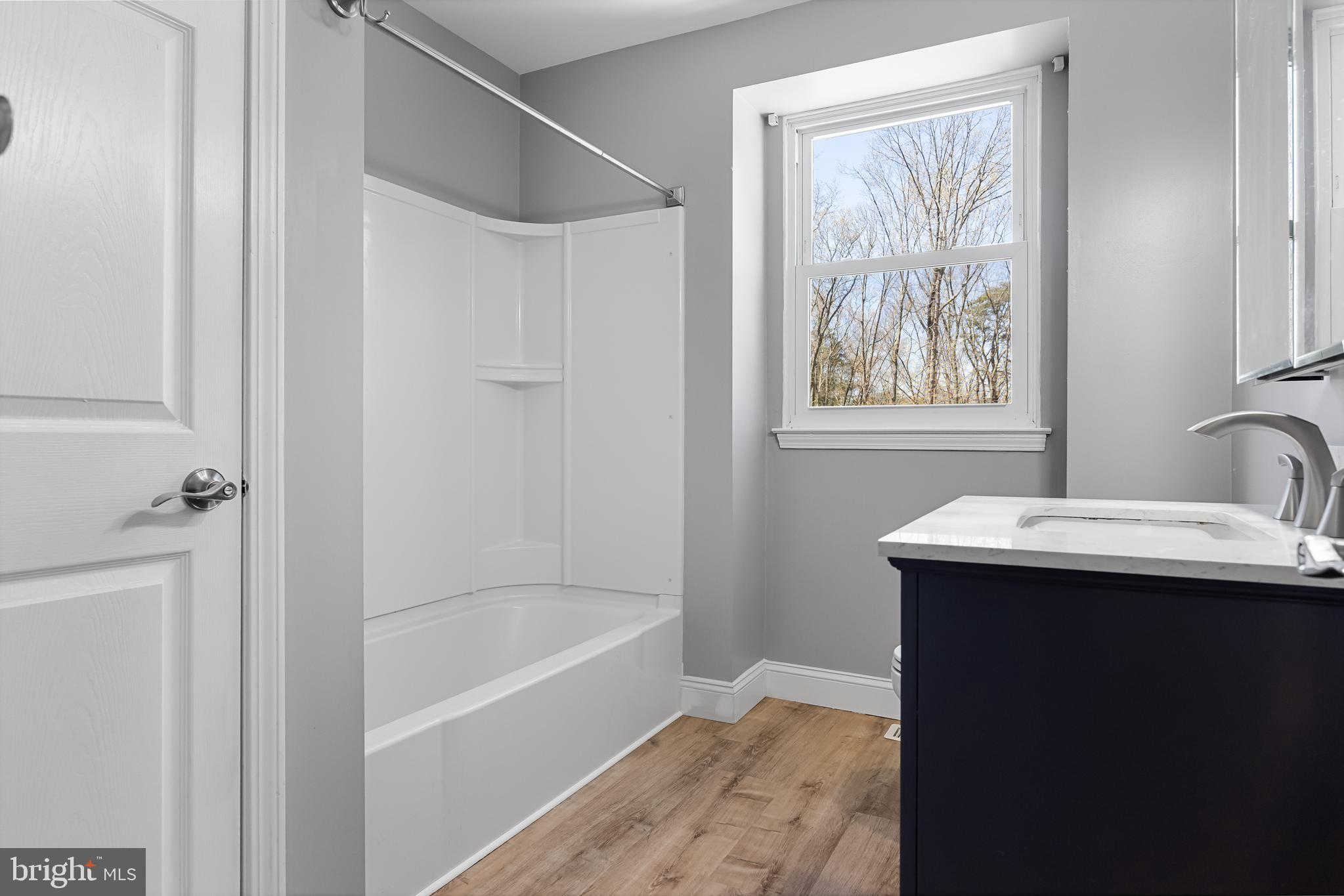 217 Forked Neck Road Shamong, NJ 08088 - Photo 26 of 35 Full Bath- LVP floors, nice vanity, tub w/surround