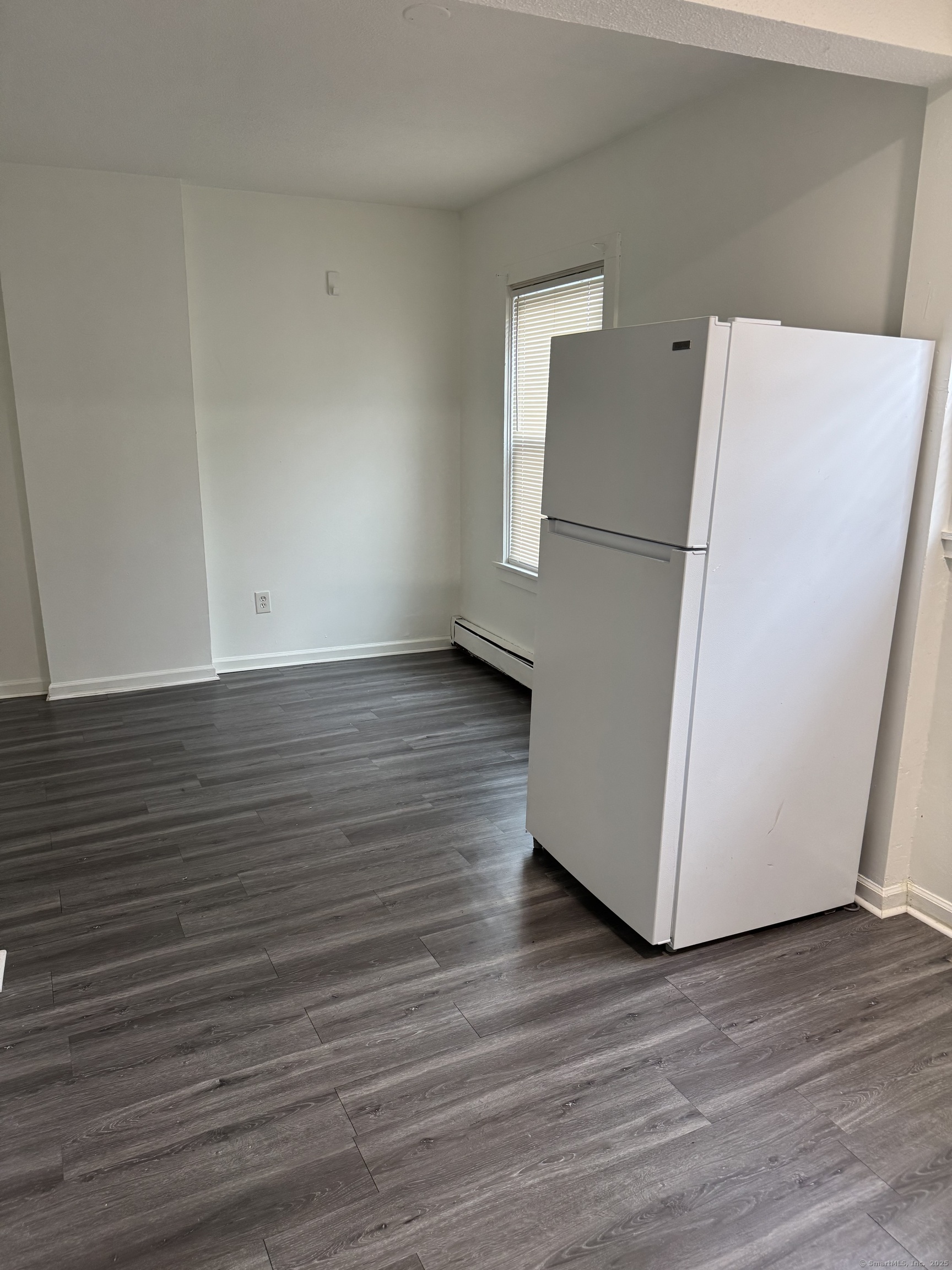 666 Main Street, Unit C4 Middletown, CT 06457 - Photo 5 of 6 a view of a kitchen with wooden floor