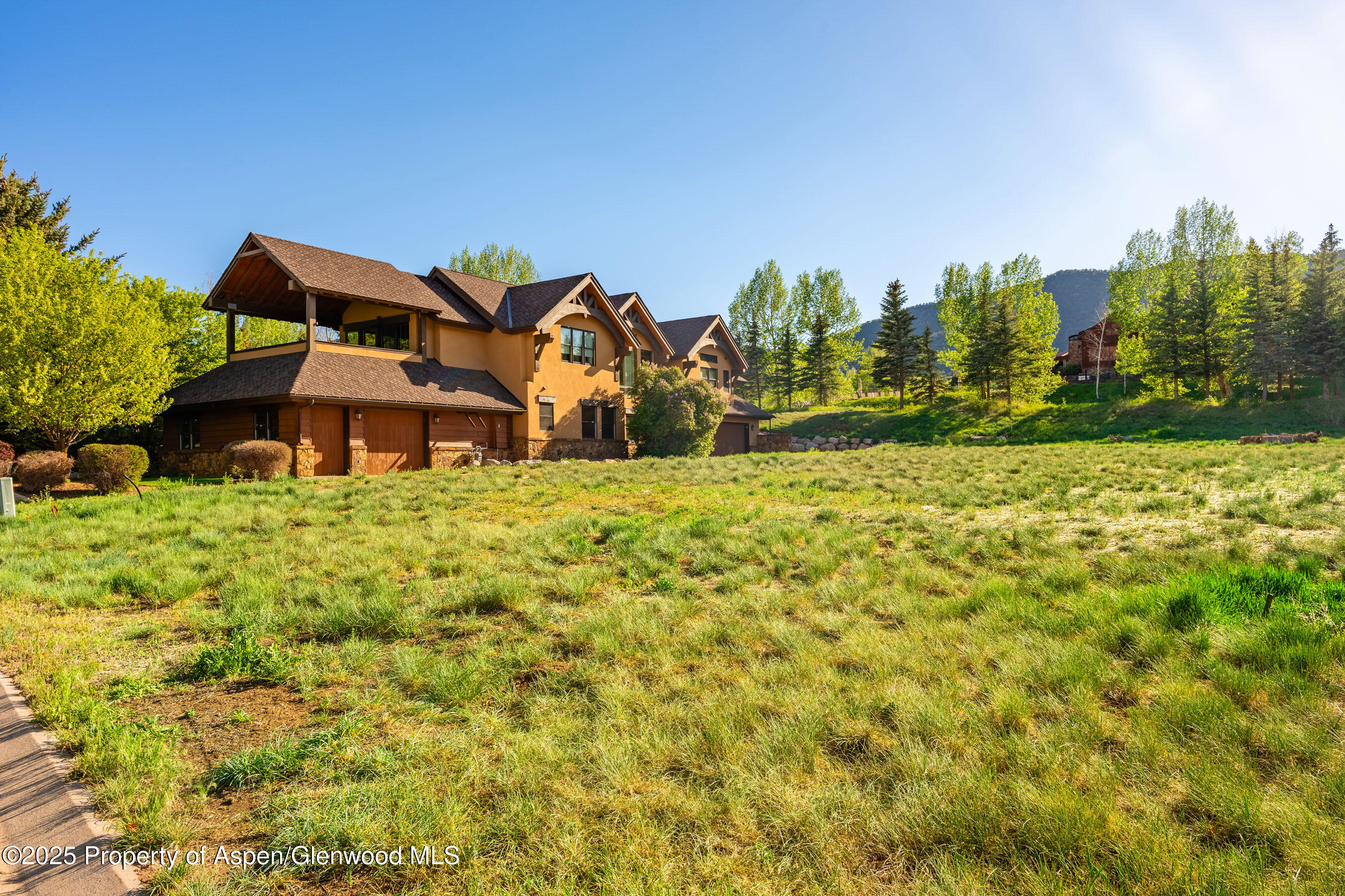 0 River Glen Road Carbondale, CO 81623 - Photo 20 of 22 a front view of a house with a yard