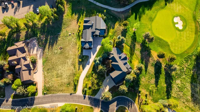 a view of an aerial view of residential houses with outdoor space