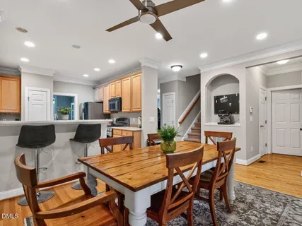 a living room with furniture rug and window