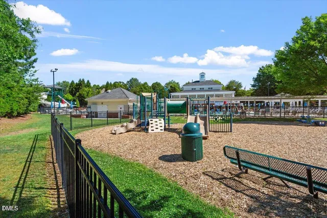 a view of a parked cars in front of a building