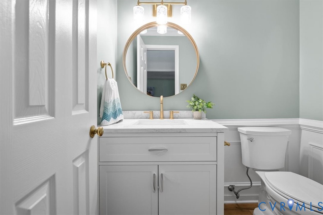 5506 Windy Ridge Terrace Midlothian, VA 23112 - Photo 24 of 50 a bathroom with a toilet sink and mirror