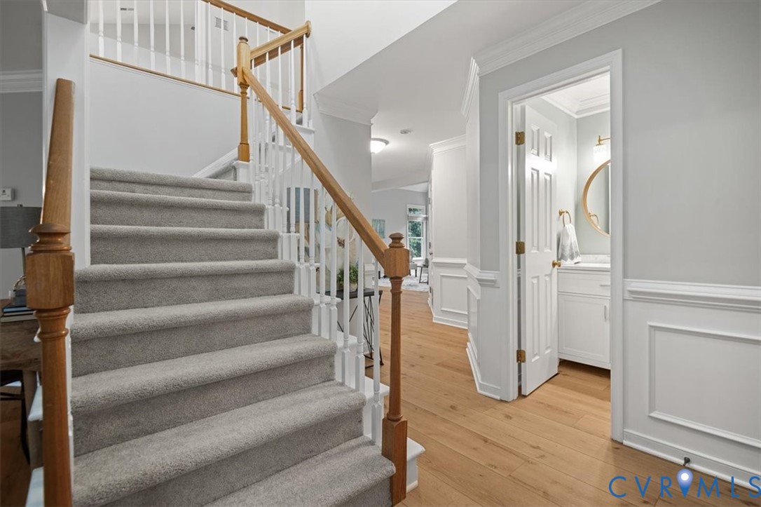 5506 Windy Ridge Terrace Midlothian, VA 23112 - Photo 25 of 50 a view of staircase with white walls and a window