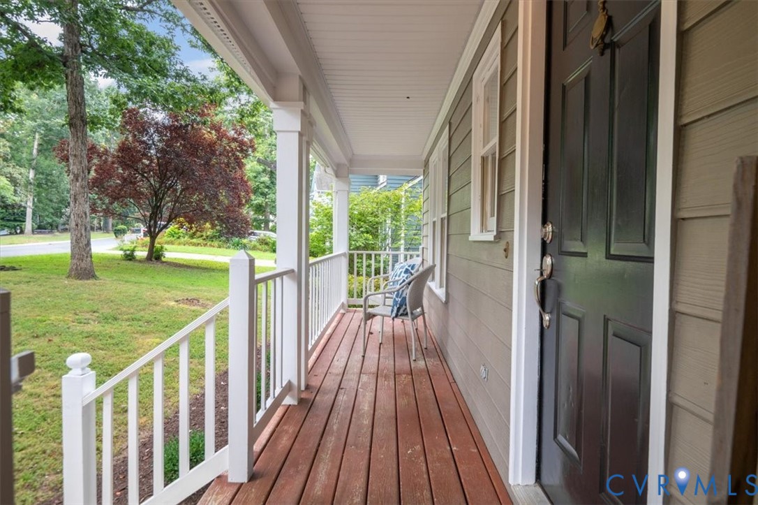 5506 Windy Ridge Terrace Midlothian, VA 23112 - Photo 3 of 50 a view of a porch with wooden floor and outdoor space
