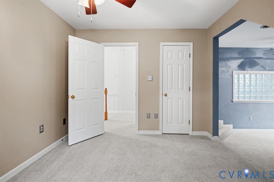 5506 Windy Ridge Terrace Midlothian, VA 23112 - Photo 35 of 50 an empty room with windows and closet