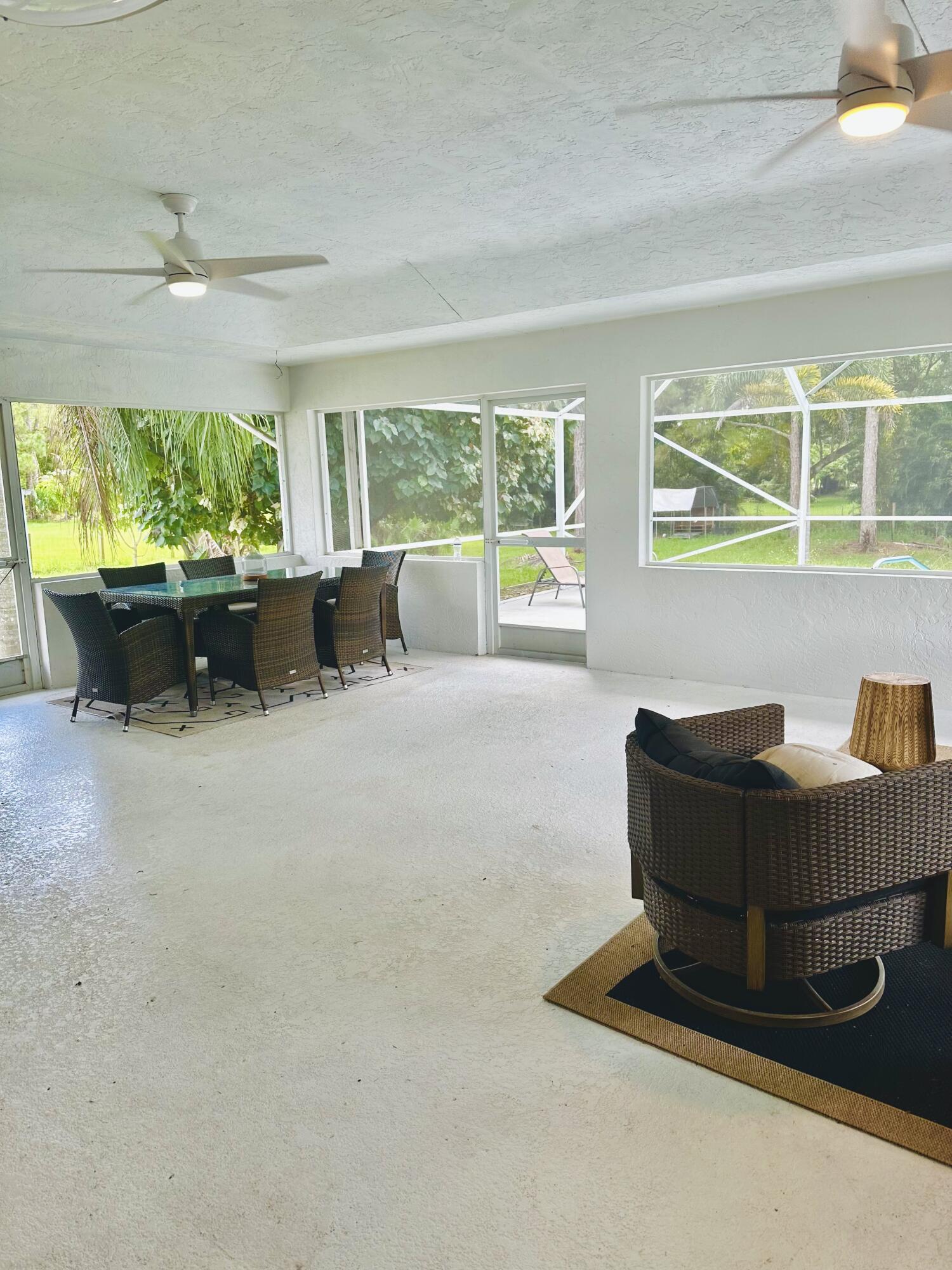 14718 85th Road North Loxahatchee, FL 33470 - Photo 24 of 45 Bonus Family Room / Patio