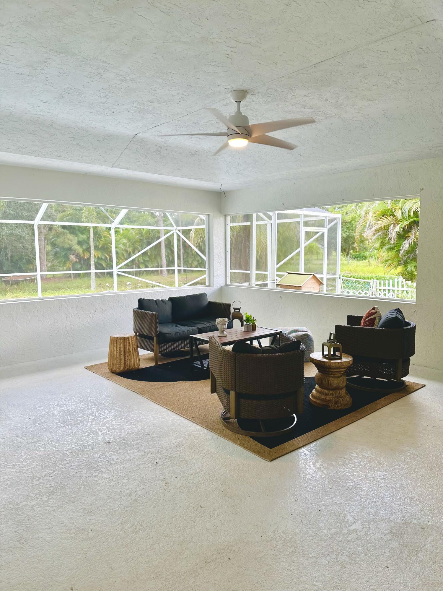 14718 85th Road North Loxahatchee, FL 33470 - Photo 25 of 45 Bonus Family Room / Patio