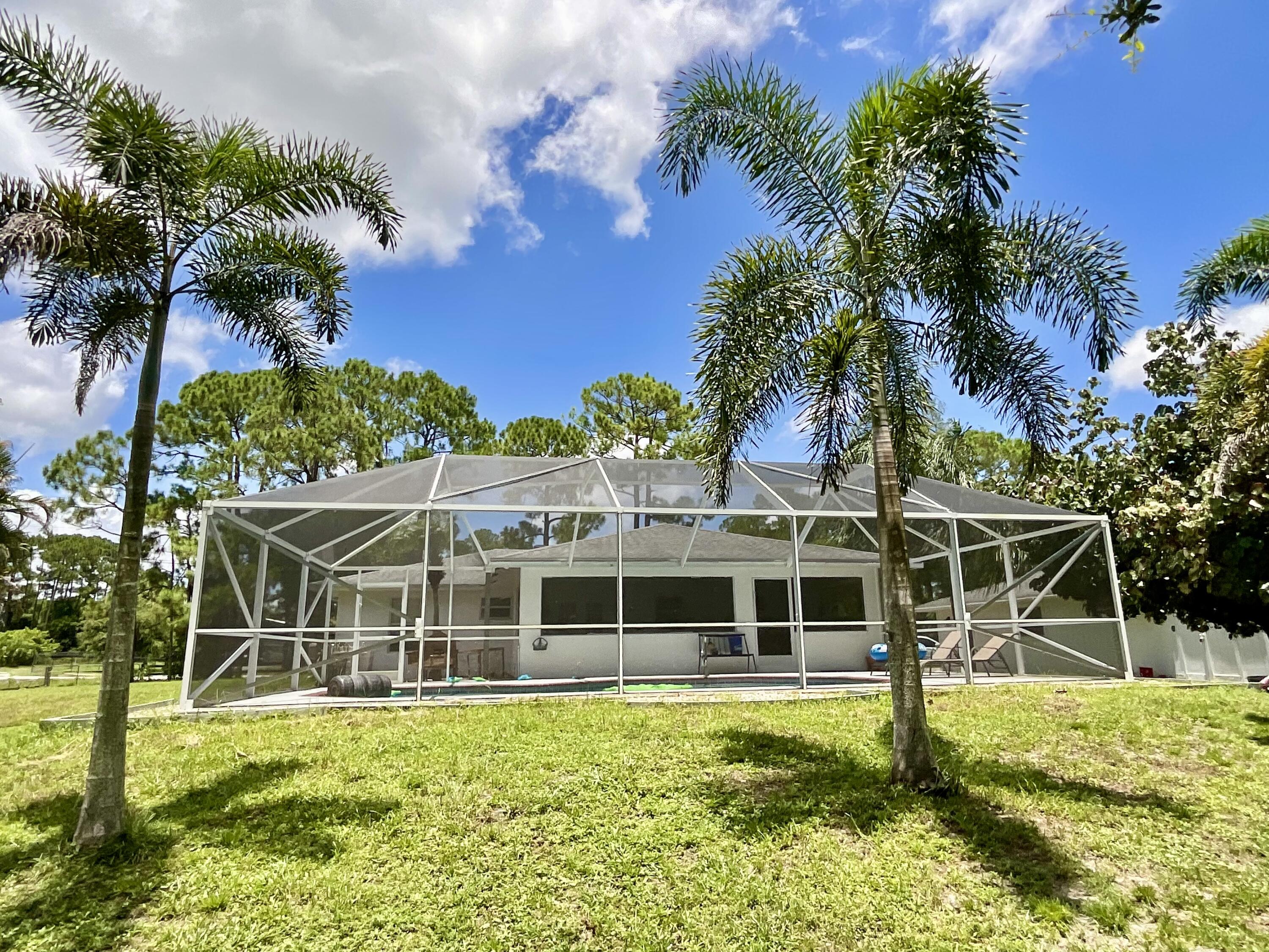 14718 85th Road North Loxahatchee, FL 33470 - Photo 30 of 45 Screened Pool