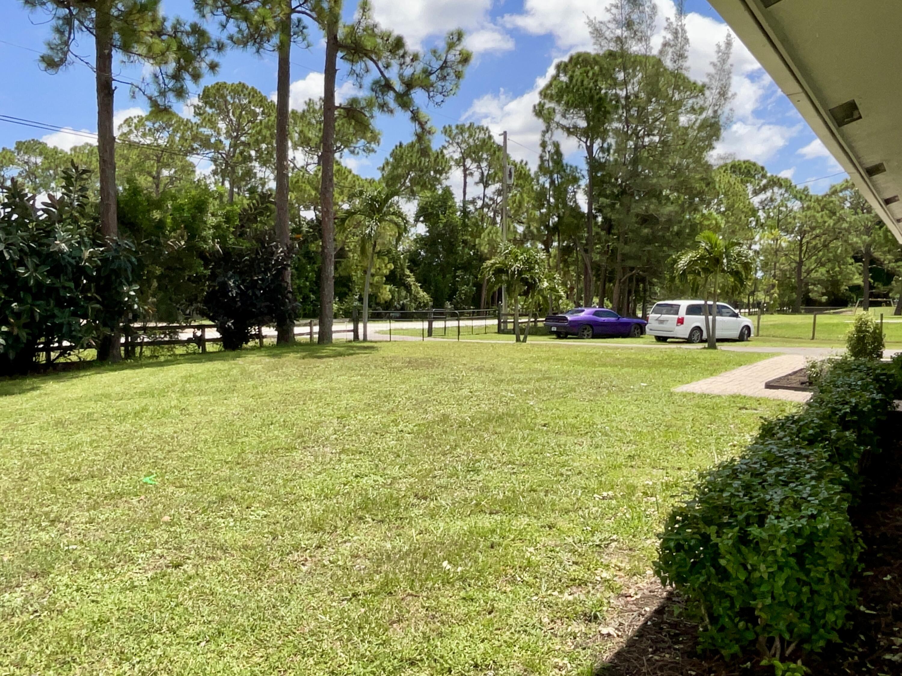 14718 85th Road North Loxahatchee, FL 33470 - Photo 37 of 45 Front Yard With Gate